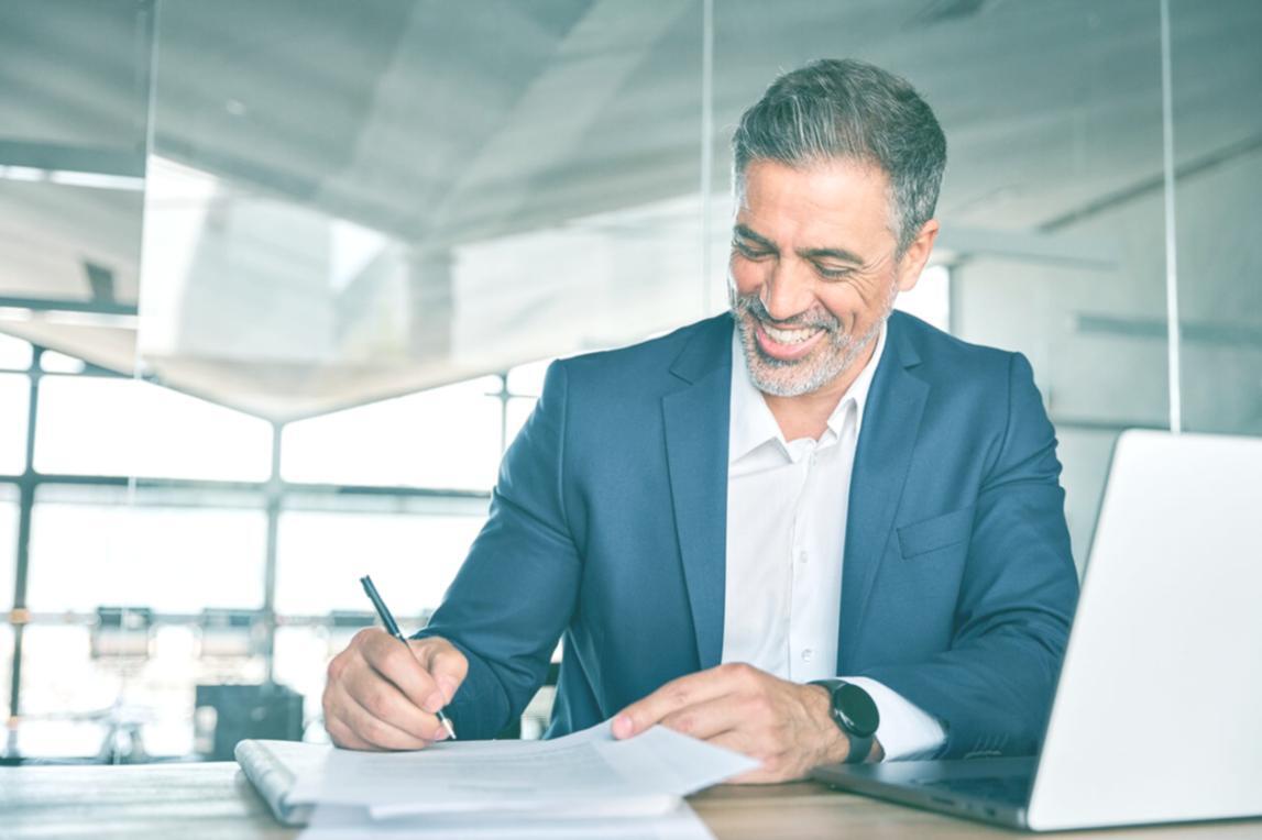 Investment strategy planning session with financial charts and analysis tools